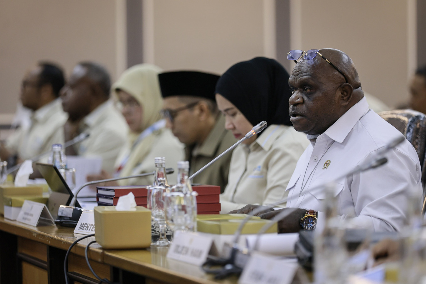 Human Rights Minister Natalius Pigai (right) delivers his presentation on Feb. 2, 2026, during a meeting with House of Representatives Commission XIII overseeing law and human rights at the Senayan legislative complex in Jakarta.