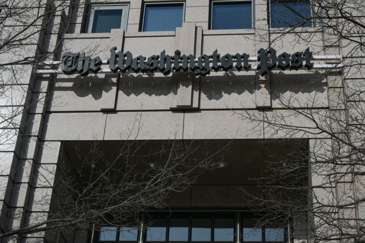 A view of the Washington Post office building in Washington, DC, on February 4, 2026. The Washington Post, owned by billionaire Amazon founder Jeff Bezos, announced major job cuts on February 4, saying that &ldquo;painful&ldquo; restructuring was needed at the storied newspaper. 