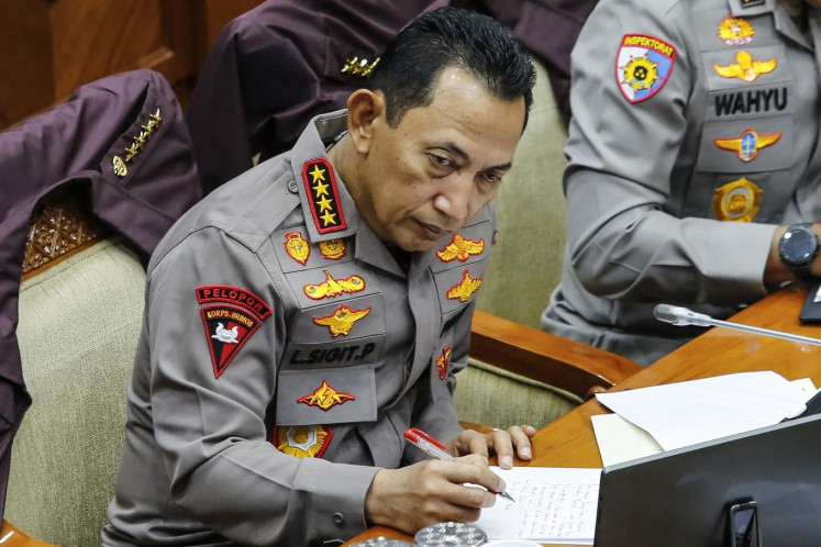 National Police chief Gen. Listyo Sigit Prabowo attends a hearing on Jan. 26, 2026, with House of Representatives Commission III, which oversees legal affairs, at the Senayan Legislative Complex in Central Jakarta. 