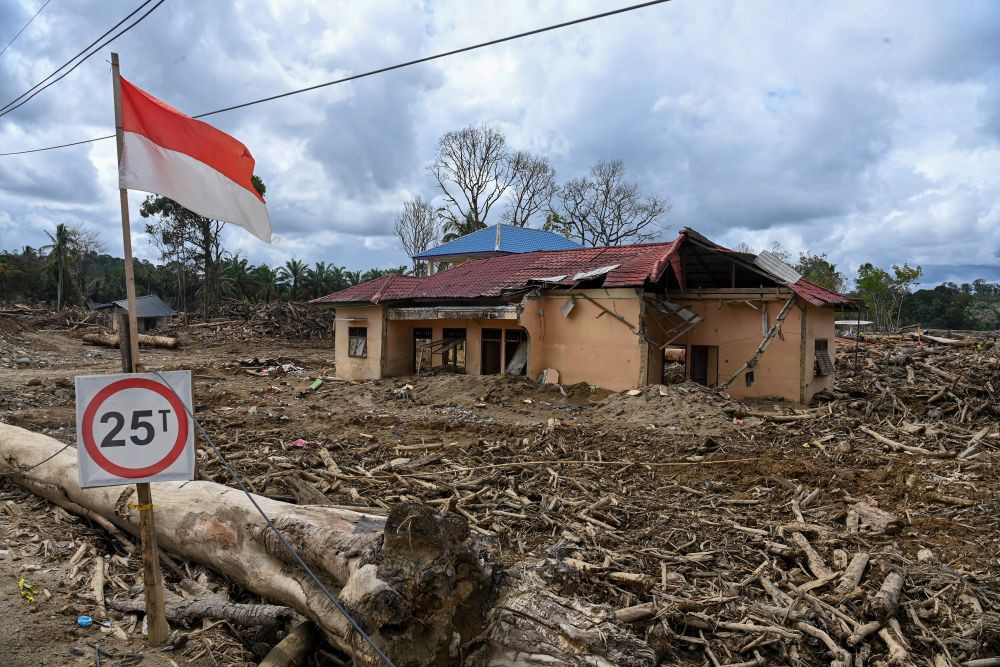 A partially collapsed house stands vacant on Jan. 29, 2026 in Garoga village of Batang Toru district, South Tapanuli regency, North Sumatra, over two months after flooding swept across three northern provinces on Sumatra in late November 2025.