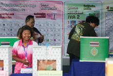 People vote in the general election at a polling station in Buriram province, Thailand, on Feb. 8, 2026.