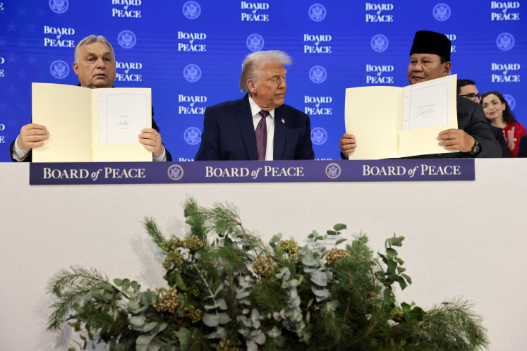 Fostering peace: President Prabowo Subianto (right), United States President Donald Trump (center) and Hungary&rsquo;s Prime Minister Viktor Orban take part in a charter announcement
for Trump&rsquo;s Board of Peace initiative aimed at resolving global conflicts, during the 56th annual World Economic Forum (WEF), in Davos, Switzerland, on Thursday, Jan. 22, 2026.