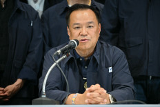 Thailand's Prime Minister and Bhumjaithai Party leader Anutin Charnvirakul speaks during a press conference while awaiting final results in Thailand's general election in Bangkok on February 8, 2026. Anutin was heading for a victory in the country's general election on February 8, television stations projected, with his party set to be by far the largest in parliament after riding a wave of nationalism.