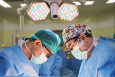 Doctors perform cardiac surgery to replace the aortic valve and a portion of the aorta, at University of Indonesia Hospital (RSUI), Depok, West Java, on Dec. 18, 2025.
