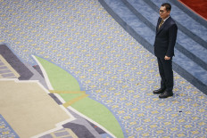 Former Golkar Party politician and House of Representatives deputy speaker Adies Kadir attends a House plenary session at the Senayan Legislative Complex in Central Jakarta on Jan. 27, 2026. The House appointed Adies as its appointee for the Constitutional Court justice seat to replace incumbent Justice Arief Hidayat who is due to retire. 