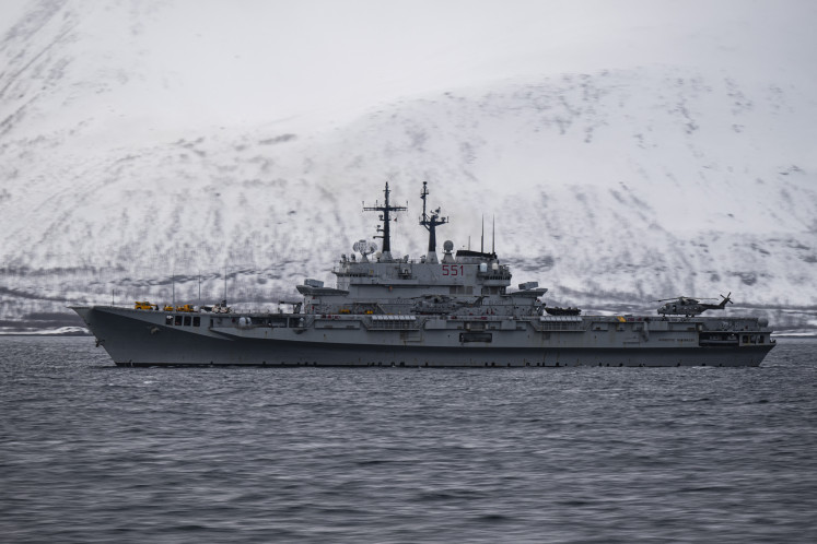 The Giuseppe Garibaldi, an Italian aircraft carrier, the first through-deck aviation ship ever built for the Italian Navy, is pictured on March 10, 2024, during the Nordic Response 24 military exercise at sea near Sorstraumen, above the Arctic Circle in Norway.