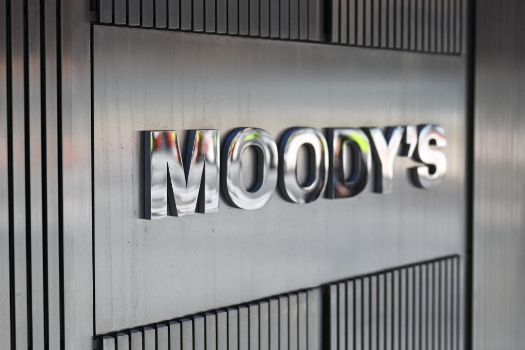 Signage for Moody's Corporation is displayed at their headquarters at 7 World Trade Center on March 18, 2025, in New York City, United States. 