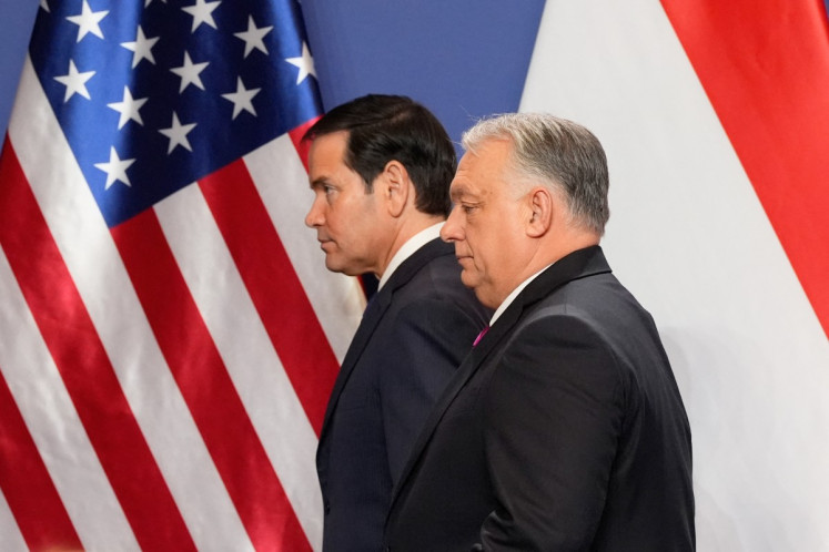 Hungary's Prime Minister Viktor Orban and US Secretary of State Marco Rubio (left) leave after a joint press conference following talks during a visit in Budapest, Hungary, on February 16, 2026. 