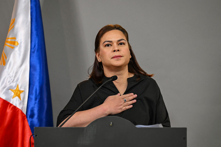 Philippine Vice President Sara Duterte announces her intention to run for the country's presidency in 2028 during a press conference in Mandaluyong, Metro Manila on February 18, 2026. 