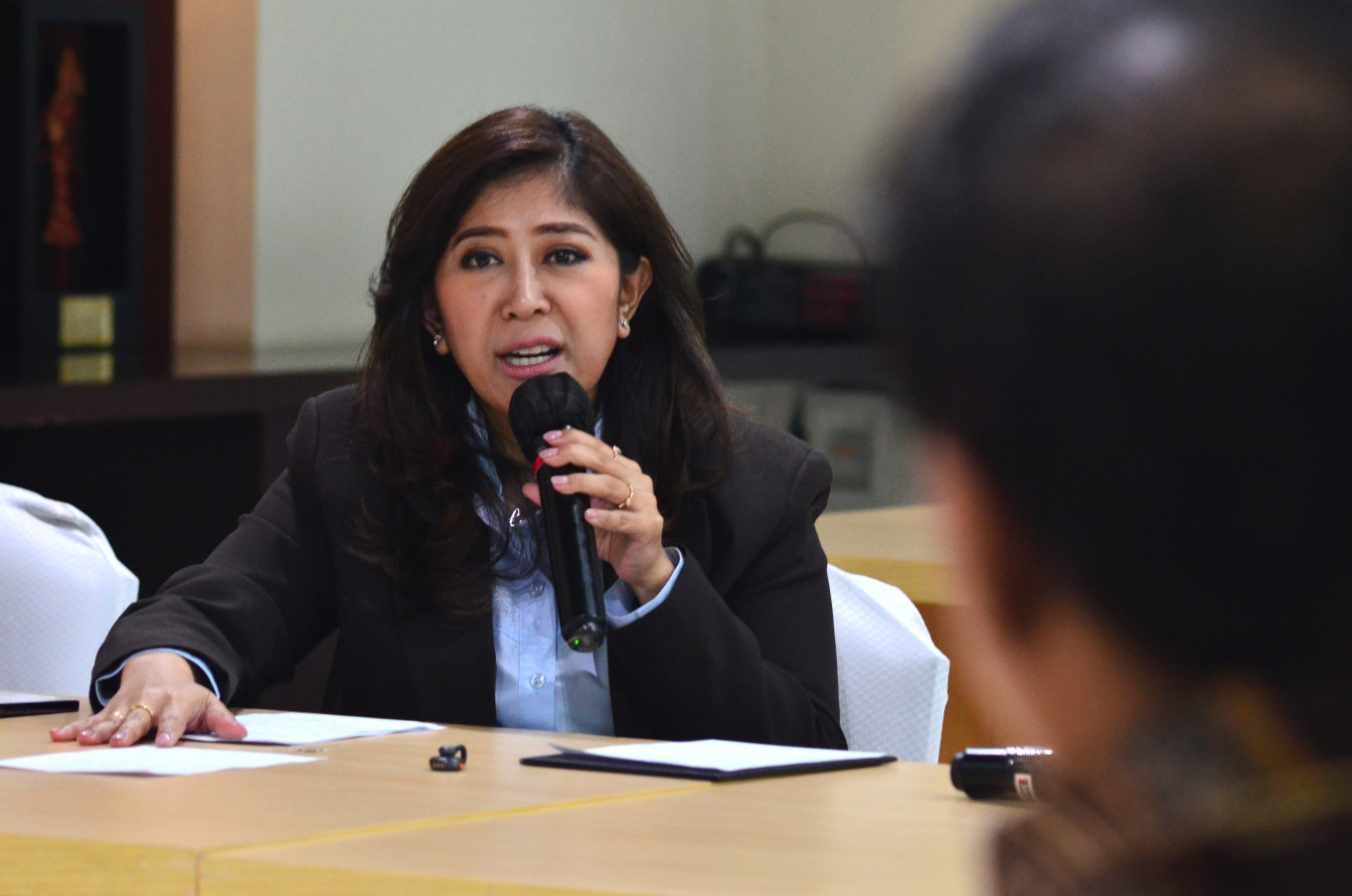 Meutya Hafid, Communication and Digital Minister, speaks during a meeting as part of a media visit by the Communication and Digital Ministry to the The Jakarta Post building in Jakarta on Thursday, Feb. 19, 2026.