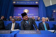 President Prabowo Subianto (center) sits next to Kazakhstan's President Kassym-Jomart Tokayev (right) and Deputy Prime Minister of the United Arab Emirates Abdullah bin Zayed Al Nahyan (left) during the inaugural meeting of the Board of Peace at the Donald J. Trump Institute of Peace in Washington, DC on Feb. 19, 2026. Assembled to raise money for the rebuilding and stabilization of Gaza, Trump's Board of Peace was formally established on the sidelines of World Economic Forum in January.