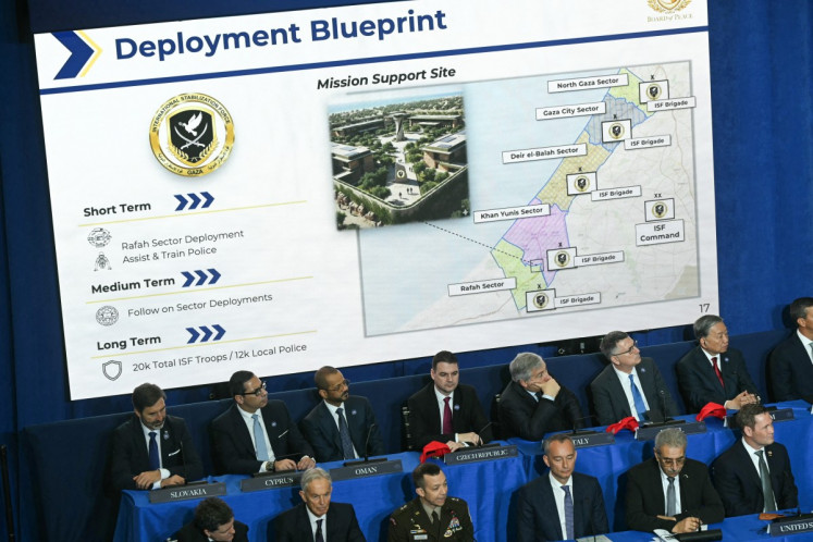 A map of Gaza is displayed as leaders attend the inaugural meeting of the Board of Peace at the Donald J. Trump Institute of Peace in Washington, DC on Feb. 19, 2026.