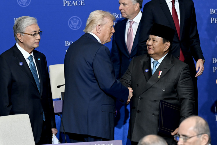 President Prabowo Subianto (right) shakes hands with United States President Donald Trump during the Board of Peace council summit on Feb. 19, 2026, in Washington, DC.