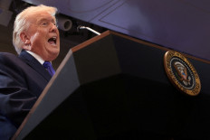 United States President Donald Trump speaks during a press briefing at the White House in Washington, D.C. on Feb. 20, 2026 following the Supreme Court's ruling that Trump had exceeded his authority when he imposed tariffs.