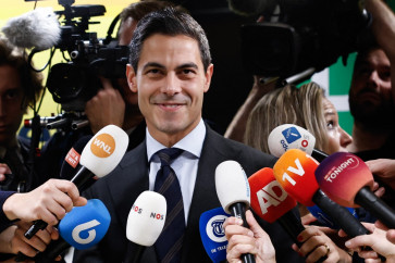 Leader of D66 (Democrats 66) Rob Jetten reacts as he delivers remarks to journalists at the D66 (Democrats 66) faction room at the Lower House, the day after the Dutch parliamentary election vote, in The Hague, on October 30, 2025. 