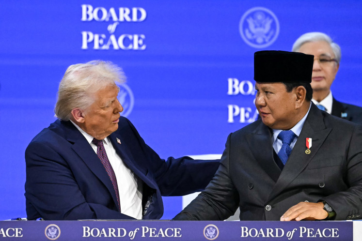 US President Donald Trump (left) shakes hands with President Prabowo Subianto at the &ldquo;Board of Peace&ldquo; meeting during the World Economic Forum (WEF) annual meeting in Davos on Jan. 22, 2026.
