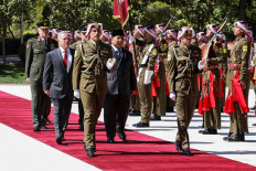 King Abdullah II of Jordan welcomes President Prabowo Subianto at Basman Palace in Amman on Feb. 25, 2026. 