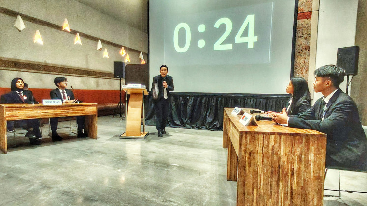 Taking a stand: Edward Christian Kusuma (center), a student from the British School Jakarta, delivers his speech as the Yemen representative on Jan. 28, 2026, during a Model United Nations simulation organized by International Global Network (IGN) at the Discovery Ancol hotel in North Jakarta.