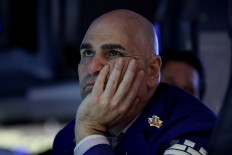 A specialist trader works on the floor at the New York Stock Exchange (NYSE) in New York City, US, on Feb. 11, 2026. 