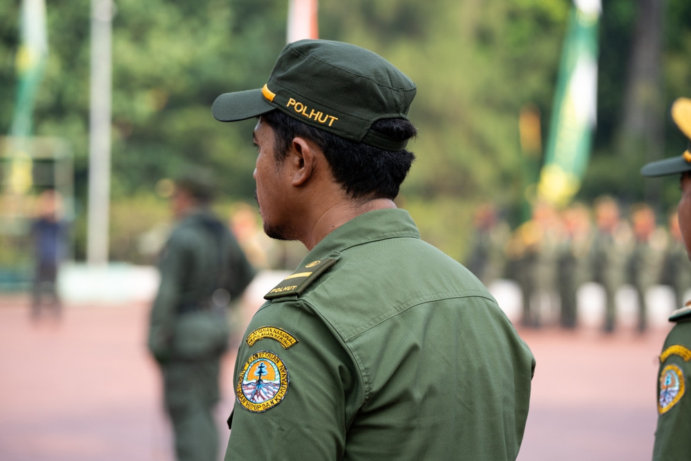 A forest ranger attends a flag-raising ceremony at the Forestry Ministry's office in Jakarta on Dec. 28, 2024.