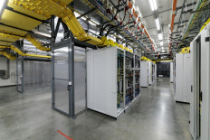 Racks of graphics processing units (GPUs) with a closed-loop liquid cooling system are seen on Feb. 4 inside an operational Microsoft data center in Karawang, West Java.