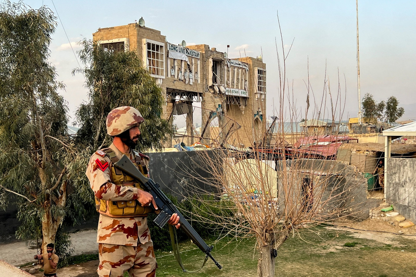 An army soldier stands guard at a post at the Friendship Gate following exchanges of fire between Pakistan and Afghanistan forces at the border crossing between the two countries in Chaman, Pakistan on Feb. 27, 2026. Picture taken with a mobile phone.