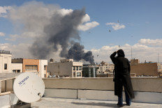 Smoke rises following an explosion, after Israel and the U.S. launched strikes on Iran, in Tehran, Iran, March 1, 2026. 