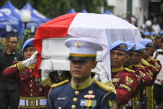 Indonesian Military (TNI) soldiers carry the coffin of former vice president and retired Army general Try Sutrisno after a prayer service at the Sunda Kelapa Grand Mosque in Central Jakarta and before his funeral at the Kalibata National Heroes Cemetery in South Jakarta on March 2, 2026. 
