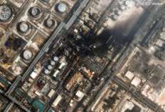 This handout satellite image courtesy of Vantor taken and released on March 2, 2026, shows damage at the Saudi Aramco's Ras Tanura refinery. The massive Ras Tanura refinery on Saudi Arabia's Gulf coast went into partial shutdown on March 2 after a strike by drones, three days into the Middle East war. 