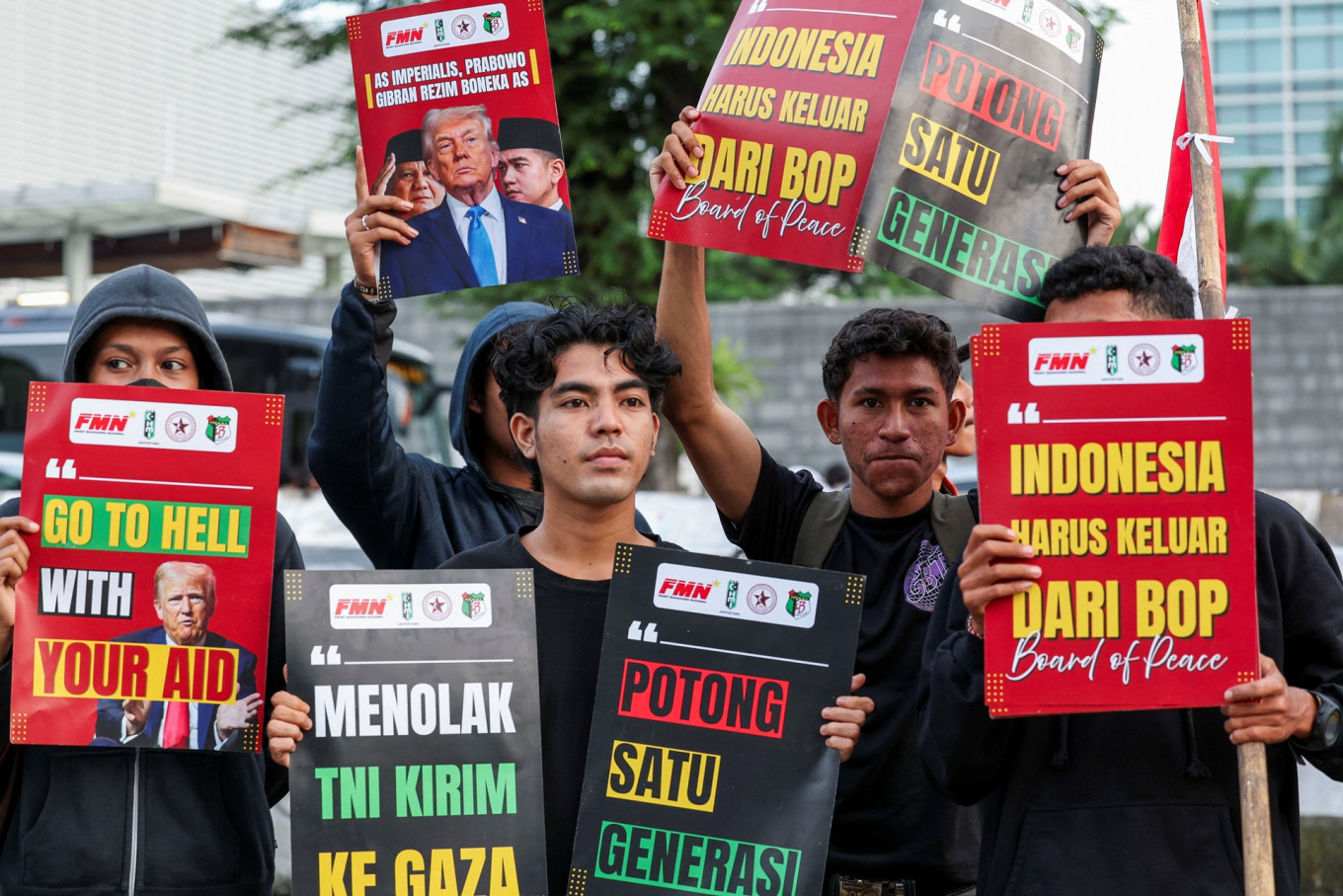 People take part in a protest outside the United States Embassy in Jakarta on March 3, 2026 to condemn the US-Israeli attack on Iran and urge the Indonesian government to revoke its membership of the US-led Board of Peace.