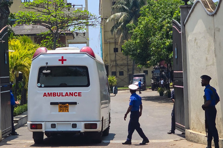 An ambulance enters Sri Lanka's southern naval head quarters in Galle on March 4, 2026, to pick up Iranian sailors rescued from Iranian frigate Iris Dena that was sunk off their island earlier in the day. Sri Lanka rescued 32 &ldquo;critically wounded&ldquo; sailors aboard the Iranian frigate IRIS Dena, which sank on March 4, just outside the island's territorial waters, Foreign Minister Vijitha Herath said. 