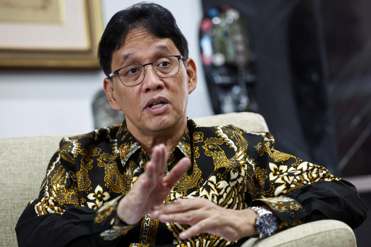Business as usual: Finance Minister Purbaya Yudhi Sadewa gestures as he speaks during an interview with Reuters in Jakarta on Tuesday, March 3, 2026.