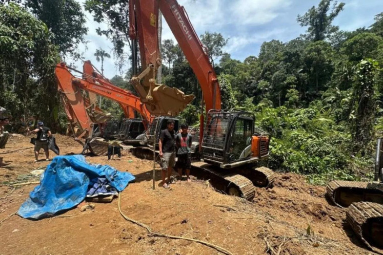 Excavators are seen in a photo released on March 3, 2026, at an illegal gold mine that was raided by North Sumatra Police in an unidentified location in North Sumatra. The police raided six illegal gold mines in South Tapanuli and Mandailing Natal regencies on March 2 and March 3.