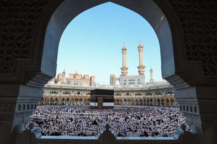 Muslims participate in a special morning prayer around the Kaaba in the Grand Mosque complex to mark the start of the Idul Adha festival on June 6, 2025, in Mecca, Saudi Arabia.