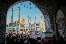 In this picture obtained from Iran's ISNA news agency on March 5, 2026, mourners in the city of Qom attend the funeral of those killed in the US-Israeli war with Iran. 