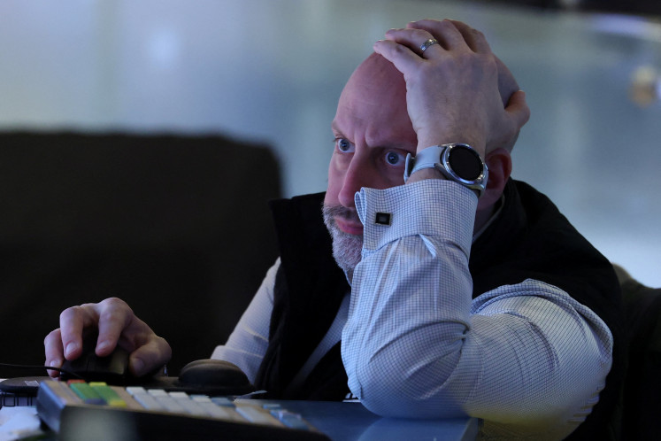 A trader works on the floor at the New York Stock Exchange (NYSE) in New York City, US, on March 5, 2026.