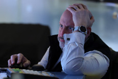 A trader works on the floor at the New York Stock Exchange (NYSE) in New York City, US, on March 5, 2026.