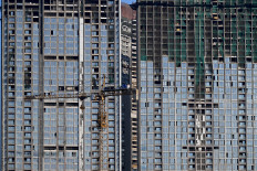 This photograph taken on Feb. 26, 2026, shows high-rise buildings under construction in Mumbai, India.