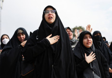 People attend a funeral ceremony for victims of Israeli and US strikes, amid the US-Israeli conflict with Iran, in Tehran, Iran, March 9, 2026. 