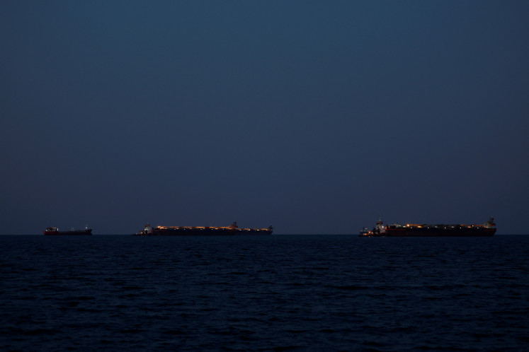 Tankers sit anchored as the traffic is down in the Strait of Hormuz, amid the US-Israeli conflict with Iran, in Muscat, Oman on March 10, 2026.