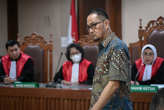 Former communications and information ministry director general of informatics applications Semuel Abrijani Pangerapan attends his verdict hearing on March 10 at the Jakarta Corruption Court. The judges found him guilty in a corruption case pertaining to the temporary national data center (PDSN) project and sentenced him to six years in prison.