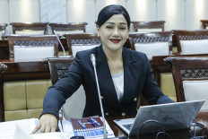 Friderica Widyasari Dewi prepares to attend a fit and proper test with the House of Representatives&rsquo; Commission XI at the Senayan Legislative Complex on March 11, 2026.