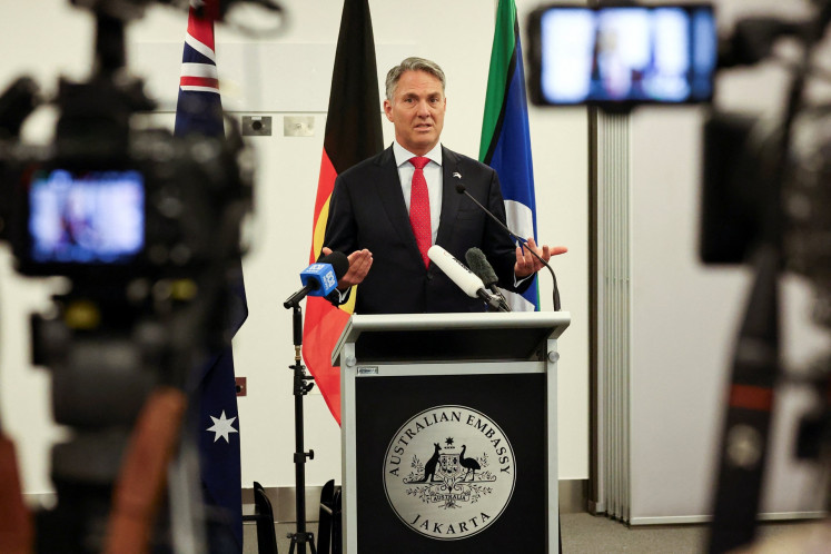 Australian Deputy Prime Minister and Defense Minister Richard Marles speaks during a press conference at the Australian embassy in Jakarta on March 12, 2026.