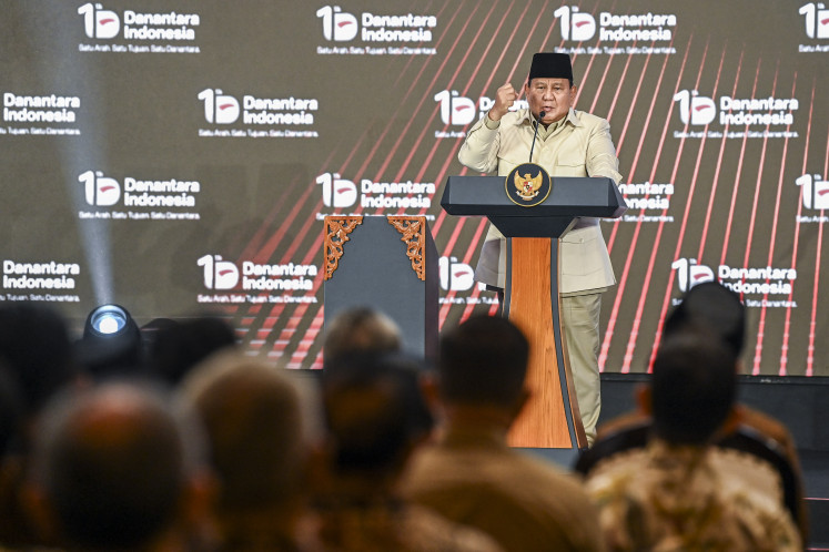 President Prabowo Subianto delivers his remarks during the first anniversary celebration of state asset fund Danantara at Wisma Danantara in Jakarta, on March 11, 2026.
