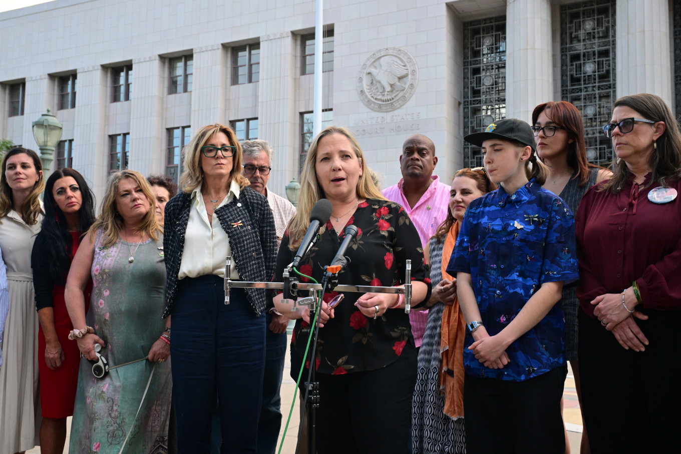 Amy Neville (center), whose son died after taking a pill bought on social media which was laced with fentanyl, speaks outside Los Angeles Superior Court on March 12, 2026, during a trial examining whether social media companies deliberately designed their platforms to be addictive to children.
