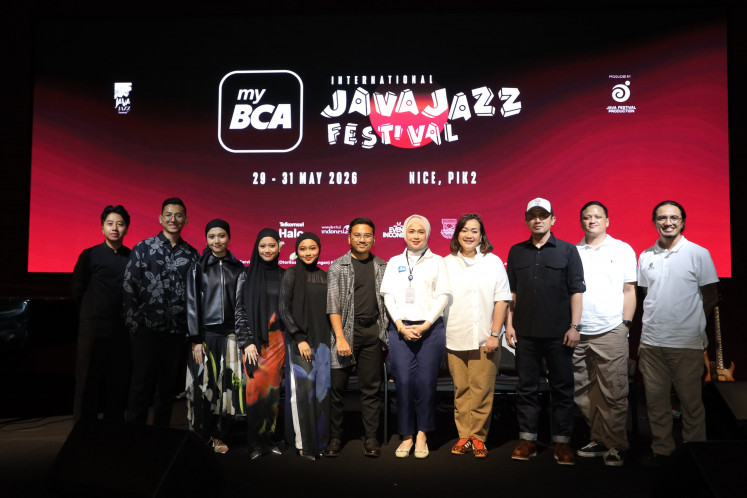 New chapter: Java Festival Production president director Dewi Gontha (fourth right) stands with fellow partners and performers on Wednesday during a press conference for the myBCA International Java Jazz Festival 2026 in Jakarta. The music festival is slated to run from May 29 to 31. Courtesy of Java Jazz Festival.