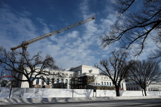 The United States Federal Reserve building is seen on Jan. 26 in Washington, DC. The US central bank is expected to leave interest rates unchanged this week, as the US-Israel war on Iran sends shock waves through markets while recent economic data showed weakness.