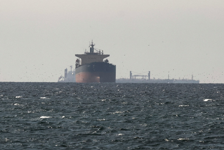Supply at risk: Tankers sail in the Gulf, near the Strait of Hormuz, on March 11, 2026, as seen from northern Ras al-Khaimah, the United Arab Emirates, near the border with Oman&rsquo;s Musandam governance, amid the United States-Israel war on Iran.