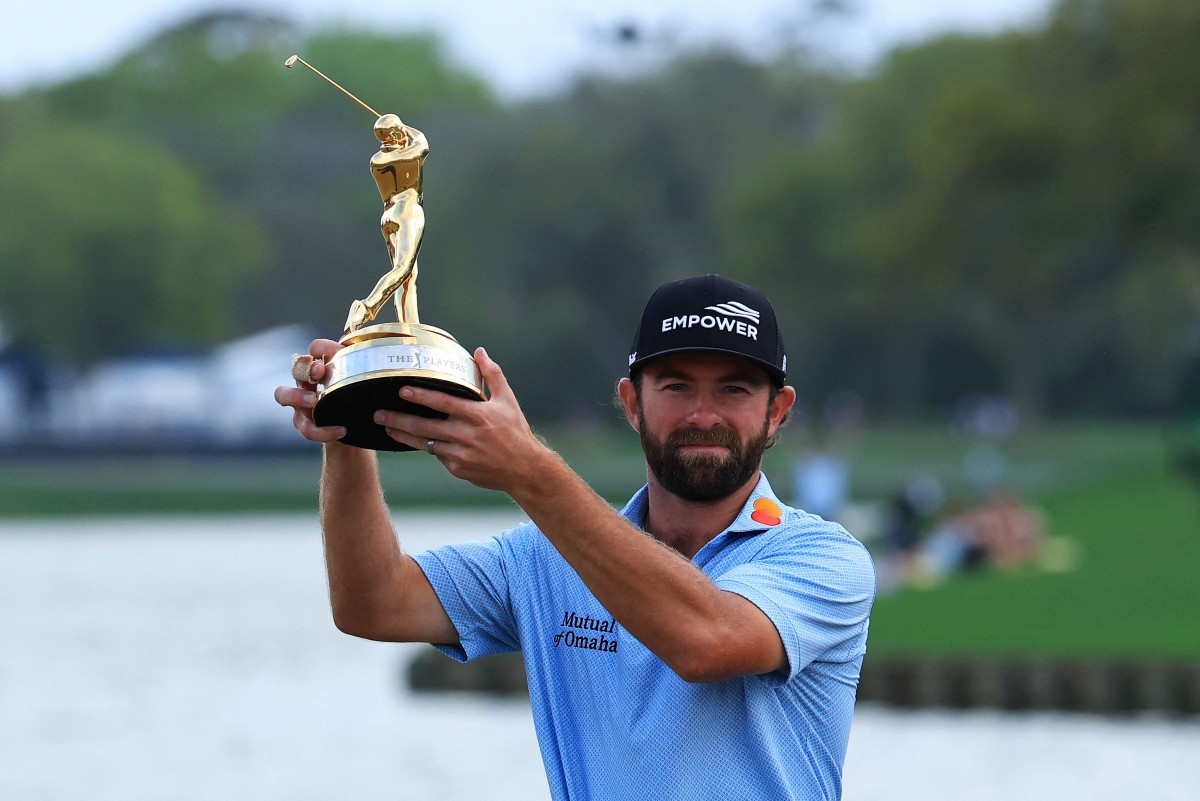 Cameron Young of the United States holds the trophy aloft following his victory during the final round of The Players Championship 2026 on March 15 at The Players Stadium course at TPC Sawgrass in Ponte Vedra Beach, Florida, the United States.