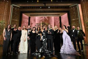 This handout picture courtesy of the Academy of Motion Picture Arts and Sciences (AMPAS) shows the cast and crew of &ldquo;One Battle After Another&ldquo; celebrating their Best Picture Oscar at the end of the 98th Annual Academy Awards at the Dolby Theatre in Hollywood, California on March 15, 2026. 